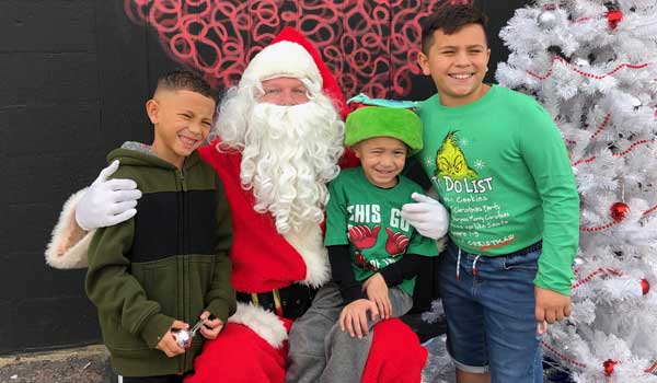 the kids with Santa Claus